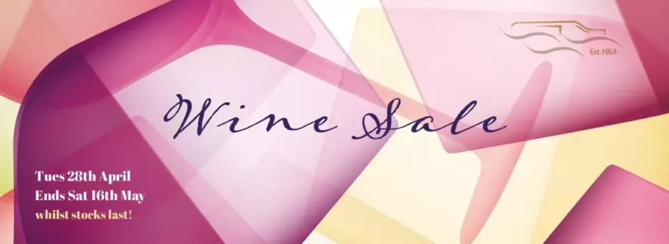 Pink abstract wine sale banner with “Wine deals” text.